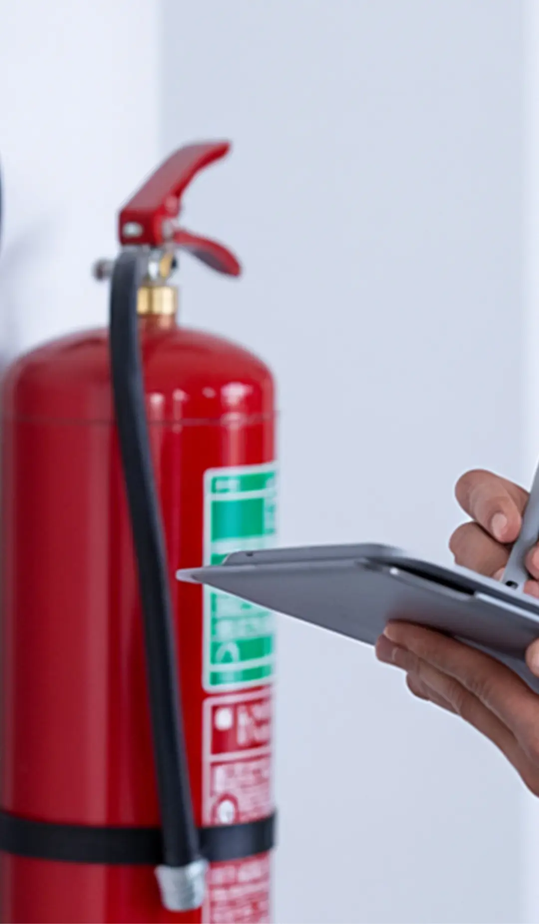 Testing and tagging a fire extinguisher for a Sydney client